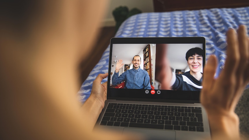 Woman in video call with friends