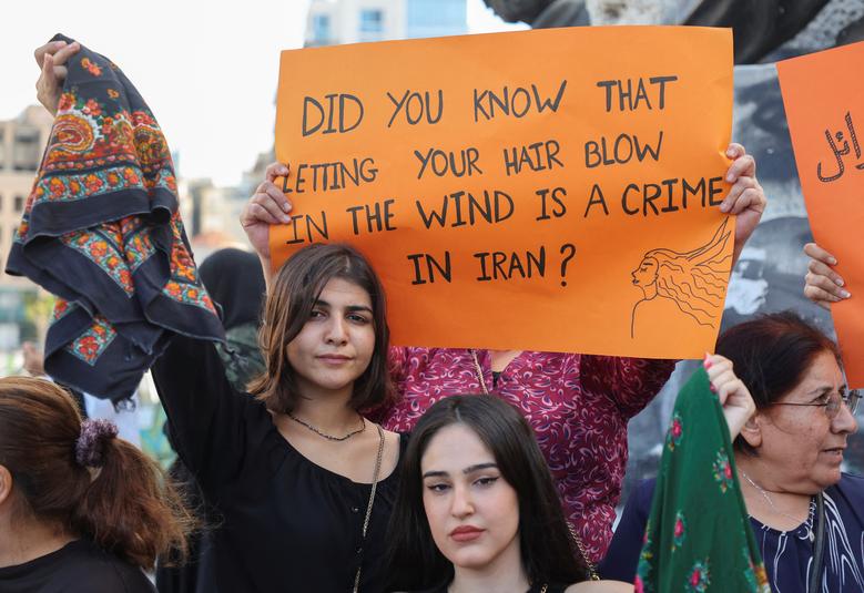 Women take part in a sit-in following the death of Mahsa Amini, at Martyrs' Square in Beirut, Lebanon