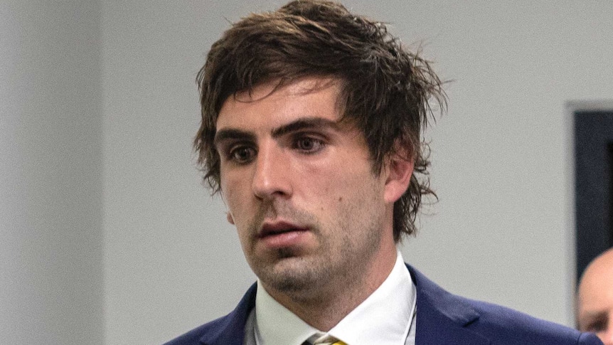 Andrew Gaff walks out of the AFL tribunal after being suspended for punching Andrew Brayshaw.