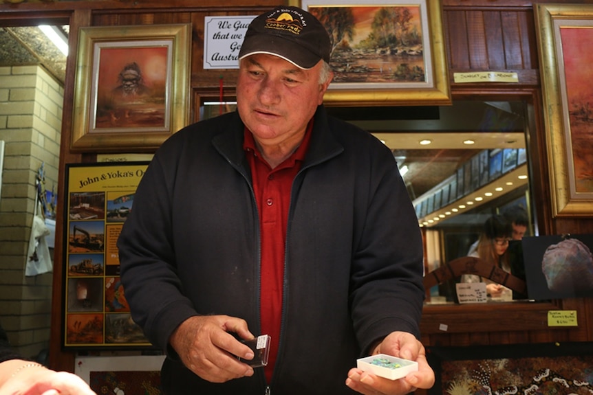 Coober Pedy opal miner John Dunstan in his store.