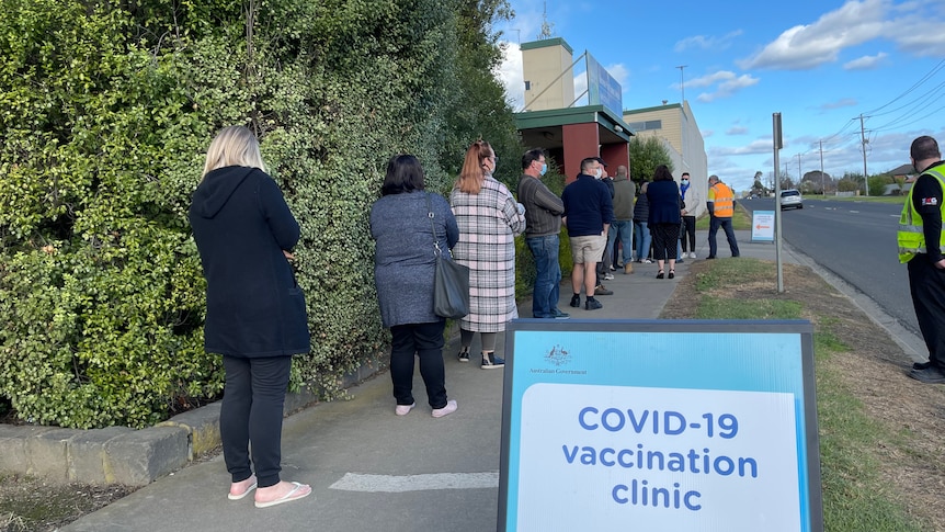 A line of people at the Trarlagon COVID vaccination clinic