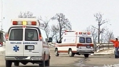 Ambulances arrive at Red Lake High School.
