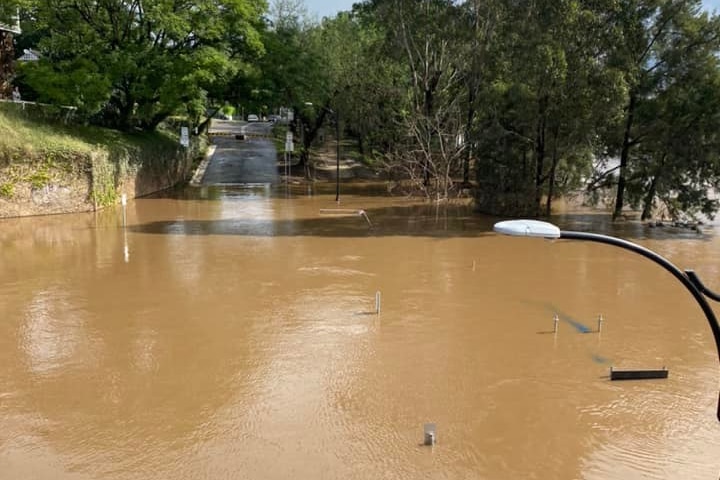 a flooded street in a sydney suburb