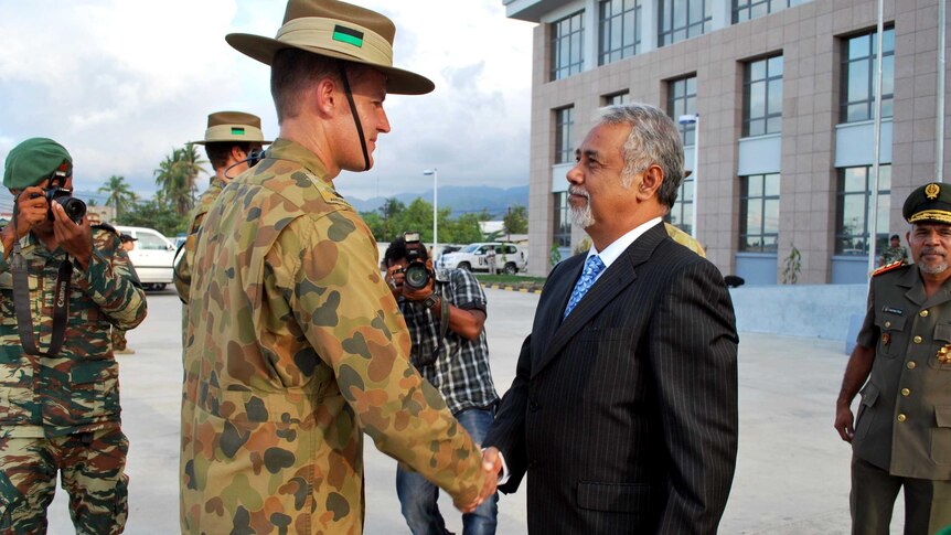 East Timor Prime Minister Xanana Gusmao, right, farewells Australian troops in Dili.