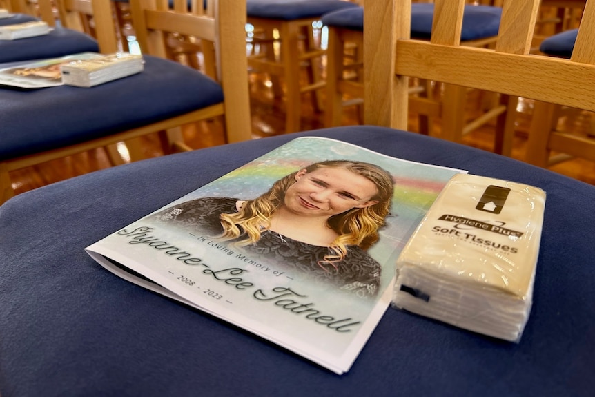Booklet with tissues on chairs at the funeral for Shyanne-Lee Tatnell.