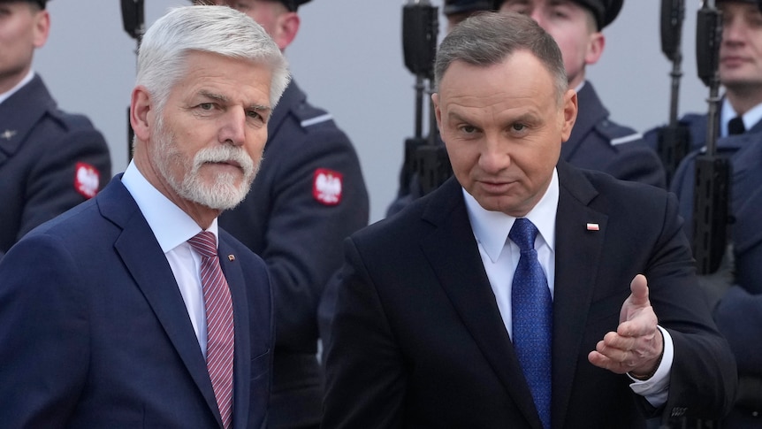 Polish President Andrzej Duda (right) with the Czech Republic President Petr Pavel, whose left arm is outstretched. 