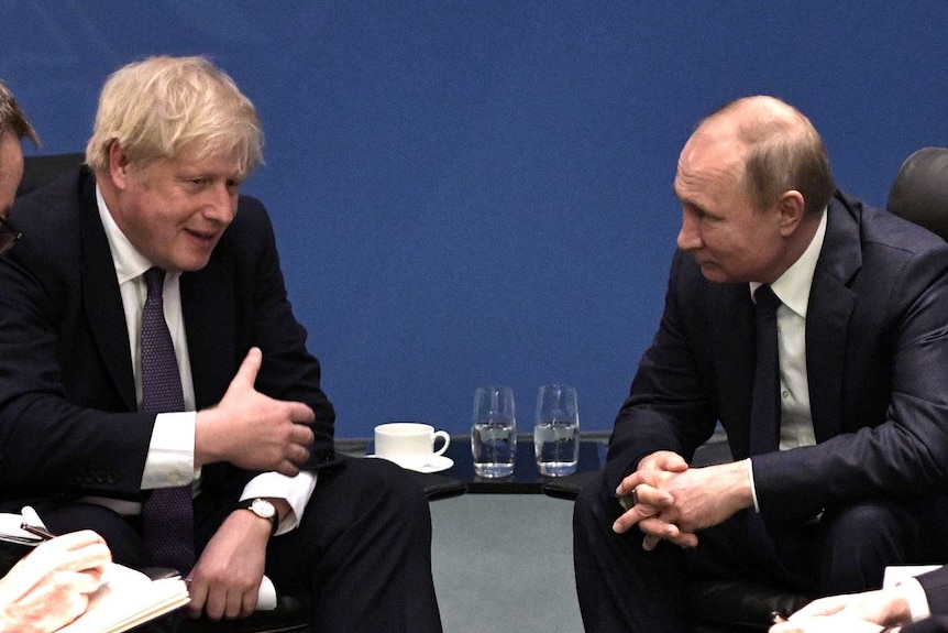 British Prime Minister Boris Johnson and Russian President Vladimir Putin meet.