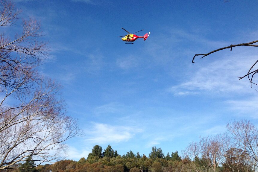 A search helicopter over the South Esk River