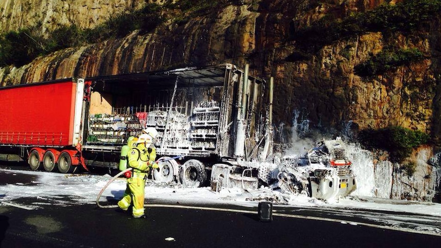 A truck carrying wine on fire on the M1 Pacific Highway in NSW.