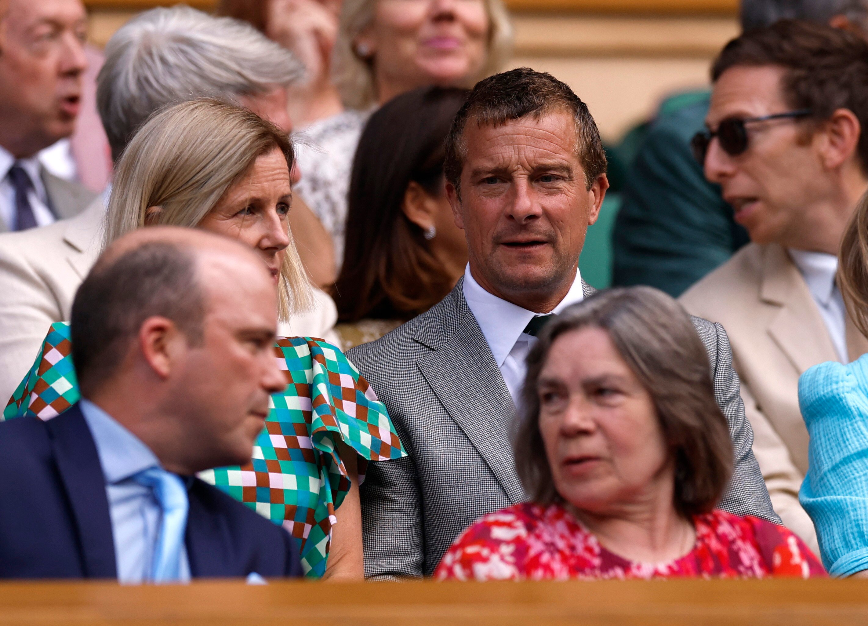  Bear Grylls and his wife Shara enjoy the royal box on Wimbledon day four. 