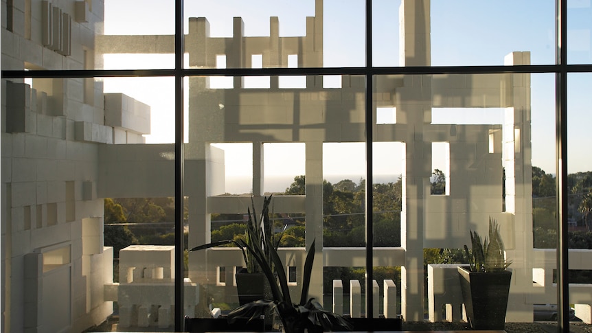 View through detailed brickwork screen at Roberts House