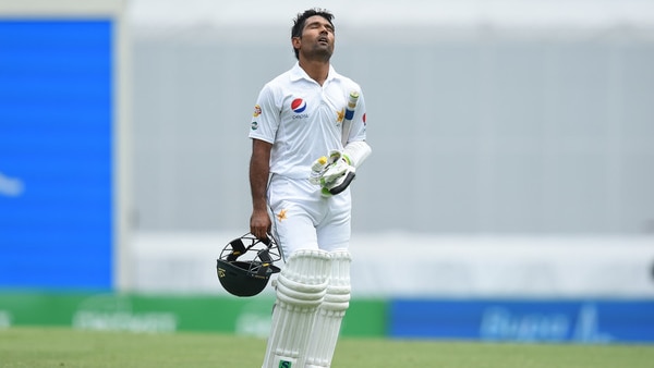 Asad Shafiq leaves the field after being dismissed at Gabba