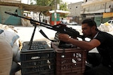 Man with a gun in Aleppo