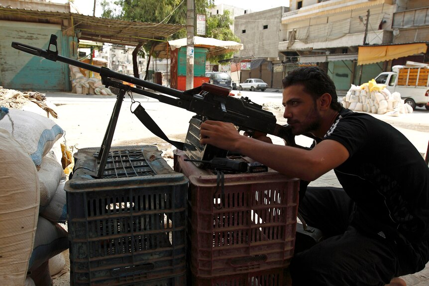 Man with a gun in Aleppo