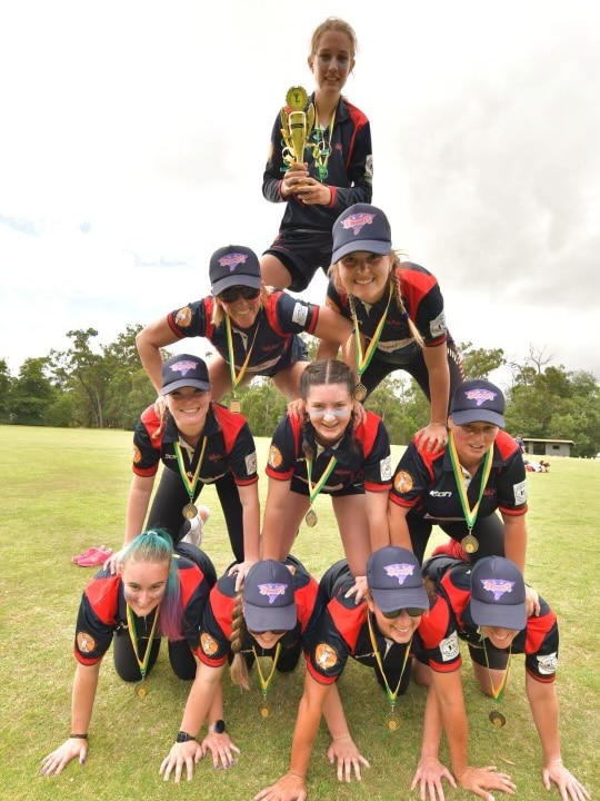 The Inverloch Cricket Club create a human pyramid.
