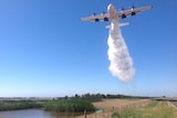 Hercules putting on an exhibition dump at Avalon Airport