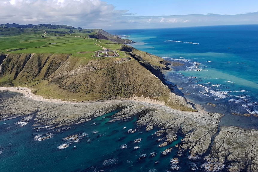 A spectacular launch site at the foot of a rocky coastal cliff.