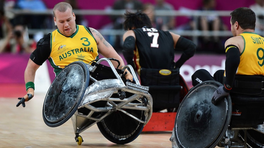 Australia's Ryley Batt (L) in action against Japan in wheelchair rugby at the London Paralympics.