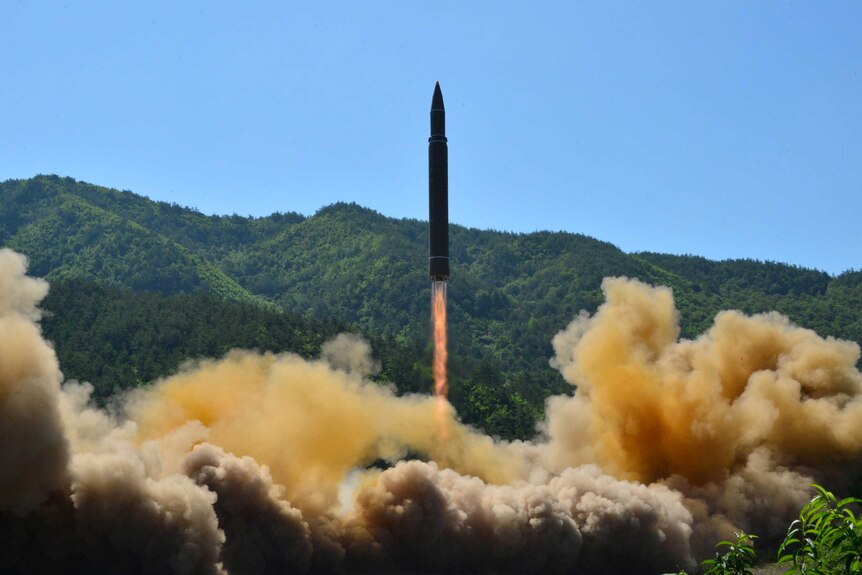 The intercontinental ballistic missile Hwasong-14 launches into the air during its test.