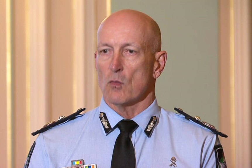 Queensland Police Deputy Commissioner Steve Gollschewski speaks to the media in Brisbane