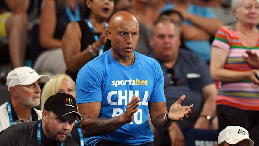 Christos Kyrgios wearing a SportsBet shirt at Nick Kyrgios Australian Open match