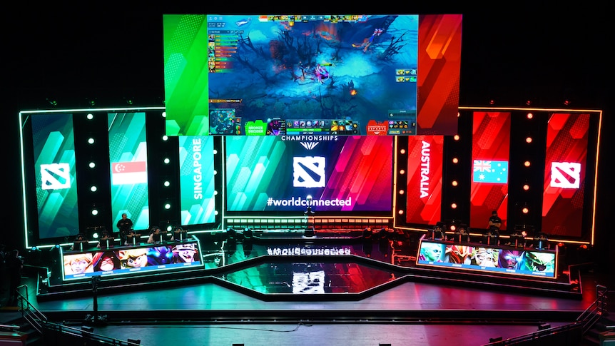 Large screens in a room at the inaugural Commonwealth Esports Championships.