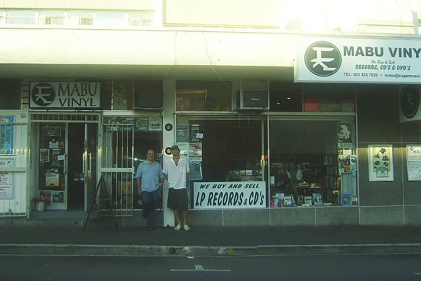 Two owners stand out the front of Mabu Records in Cape Town, South Africa
