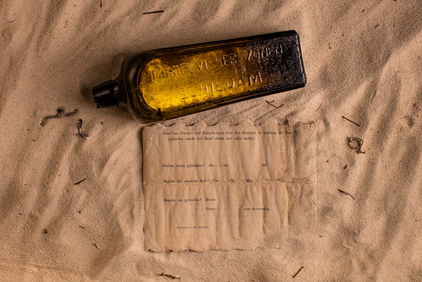 A 132-year-old gin bottle and a message within it written in German.