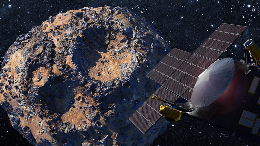 A spacecrafts solar panel is visible in the foreground, a large grey orange asteroid in the background