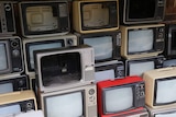 A collection of recycled analog TVs