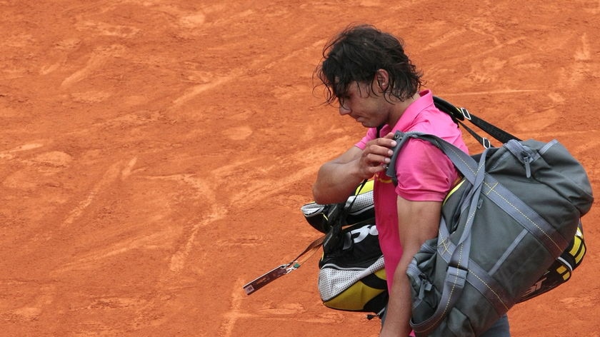 I did not play my best tennis: defeated champion Rafael Nadal leaves centre court.