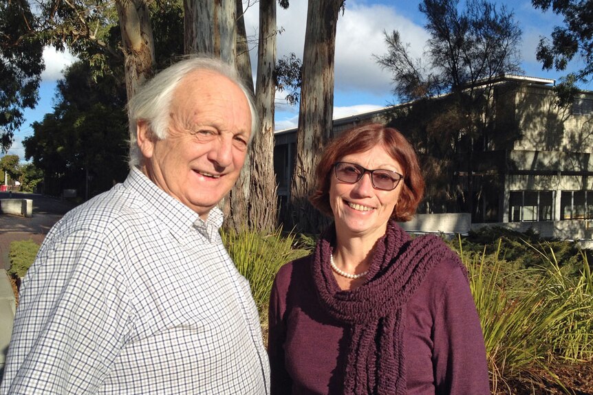 Dr Zich Woinarski and Professor Sue Kilpatrick stand in the courtyard at the University of Tasmania's Newnham Campus.