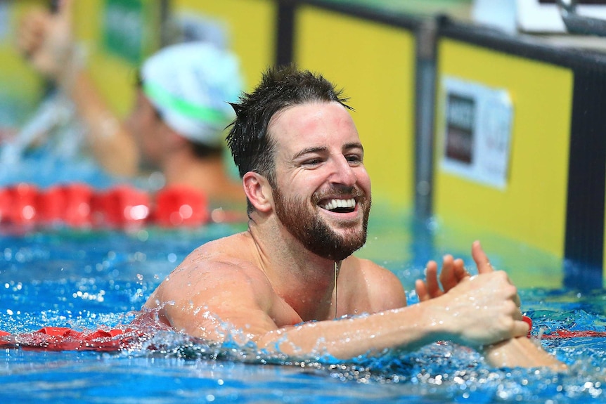 Return to form ... James Magnussen smiles after finishing second place at the Swimming Australia Grand Prix in Brisbane