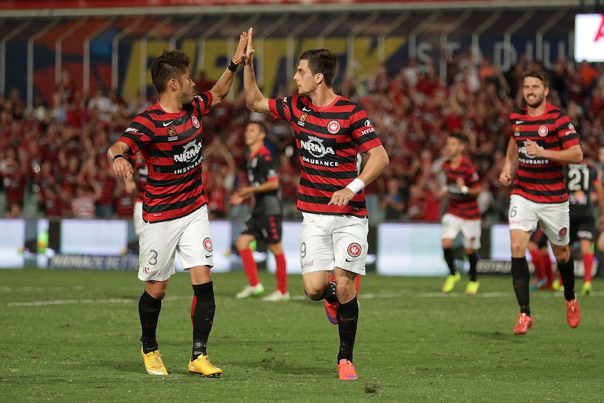 Tomi Juric celebrates his equaliser against Adelaide