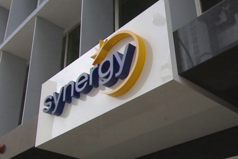 Synergy signage on a building.