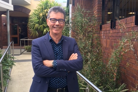 Hillbrook Anglican School principal Geoff Newton stands outside school.