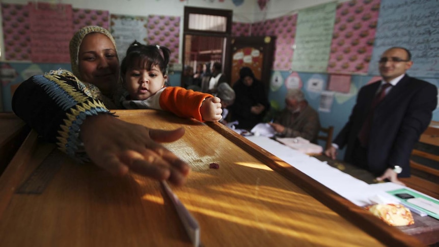 Woman voting on second day of Egypt elections