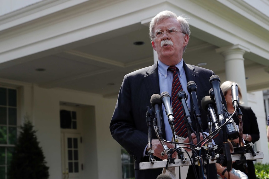 National security adviser John Bolton speaks about Venezuela outside the West Wing of the White House
