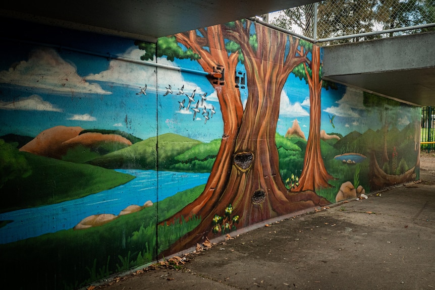 a tree painted on a wall