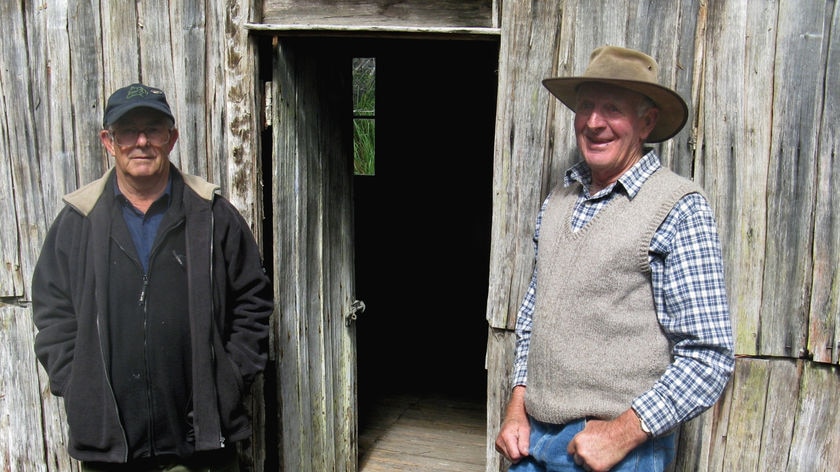 Tasmanian tiger historian Col Bailey and trappers hut restorer John Graham.