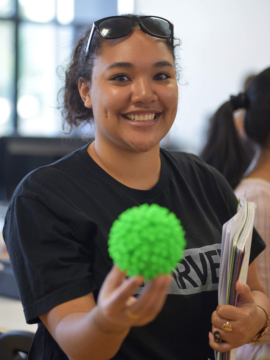 CQU student with 3D printed virus