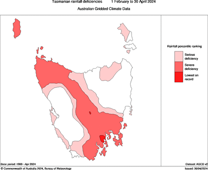 Map of Tasmania showing drought conditions in red stretching from the north west to the south east 