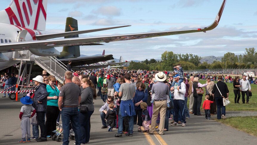 Aviation fans wander among the aircraft on display at the Canberra Airport Open Day.