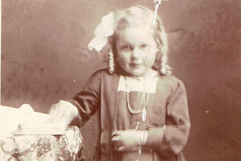 An old photo of a little girl