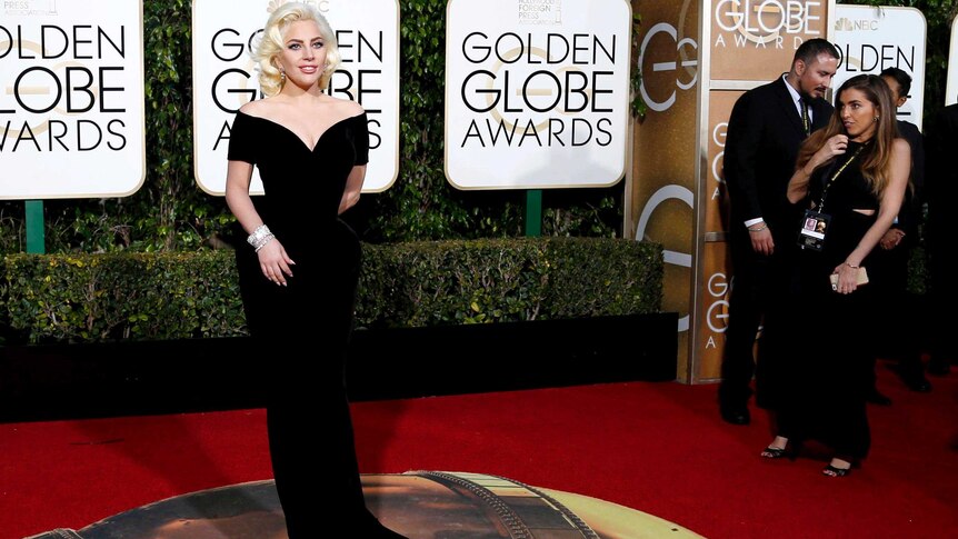 Full length of Lady Gaga on the res carpet at the Golden Globes.