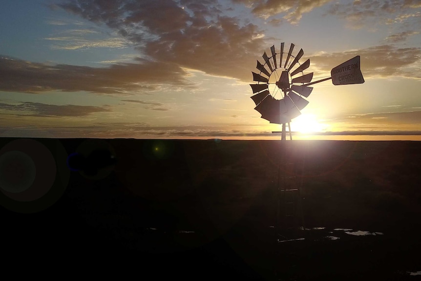 A windmill at sunrise