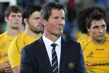 Robbie Deans and the Wallabies breathe again after winning a tight encounter against Argentina.