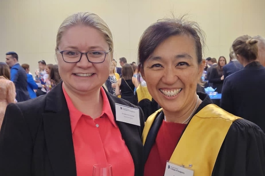 Dr Katherine Goodall and Dr Carina Chow stand next to each other, smiling
