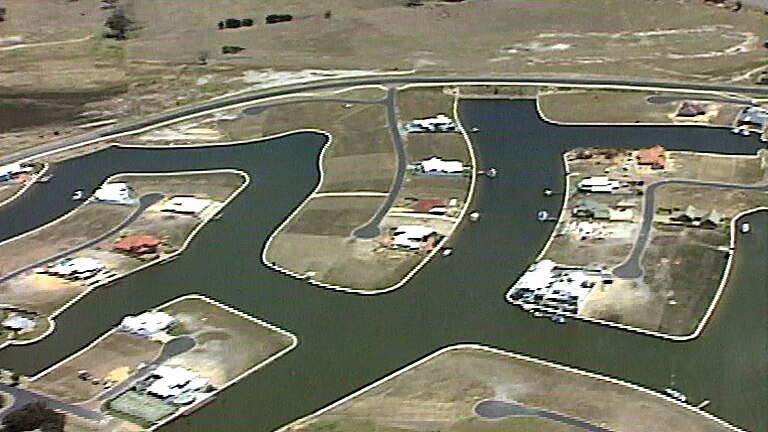 An old aerial shot of newly-built canals in Mandurah two decades ago.