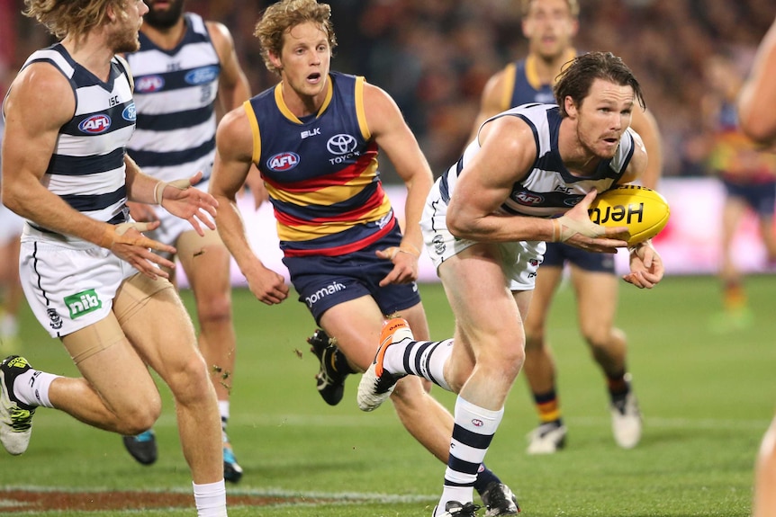 Patrick Dangerfield on the ball for Geelong against Adelaide